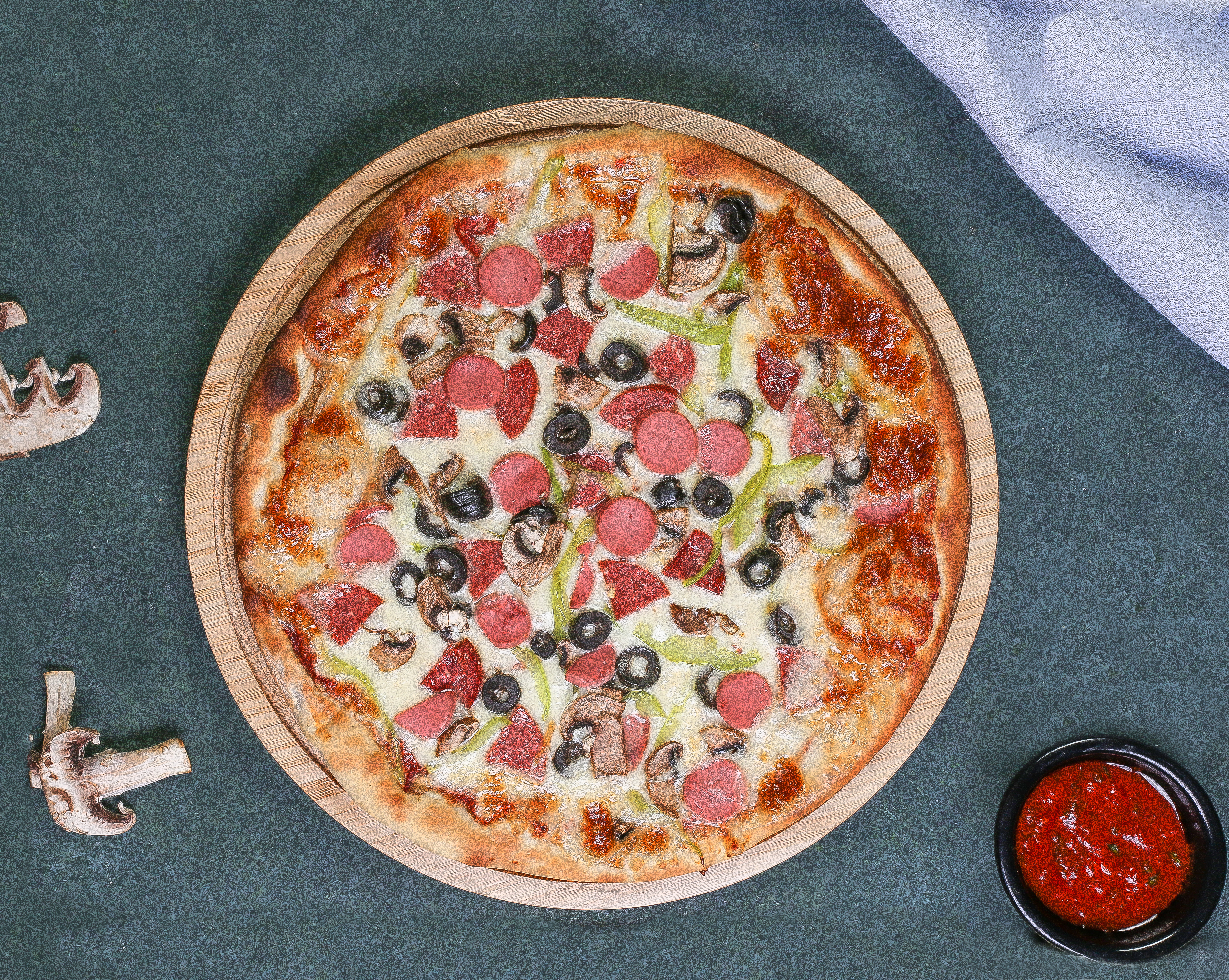 Hands stretching pizza dough