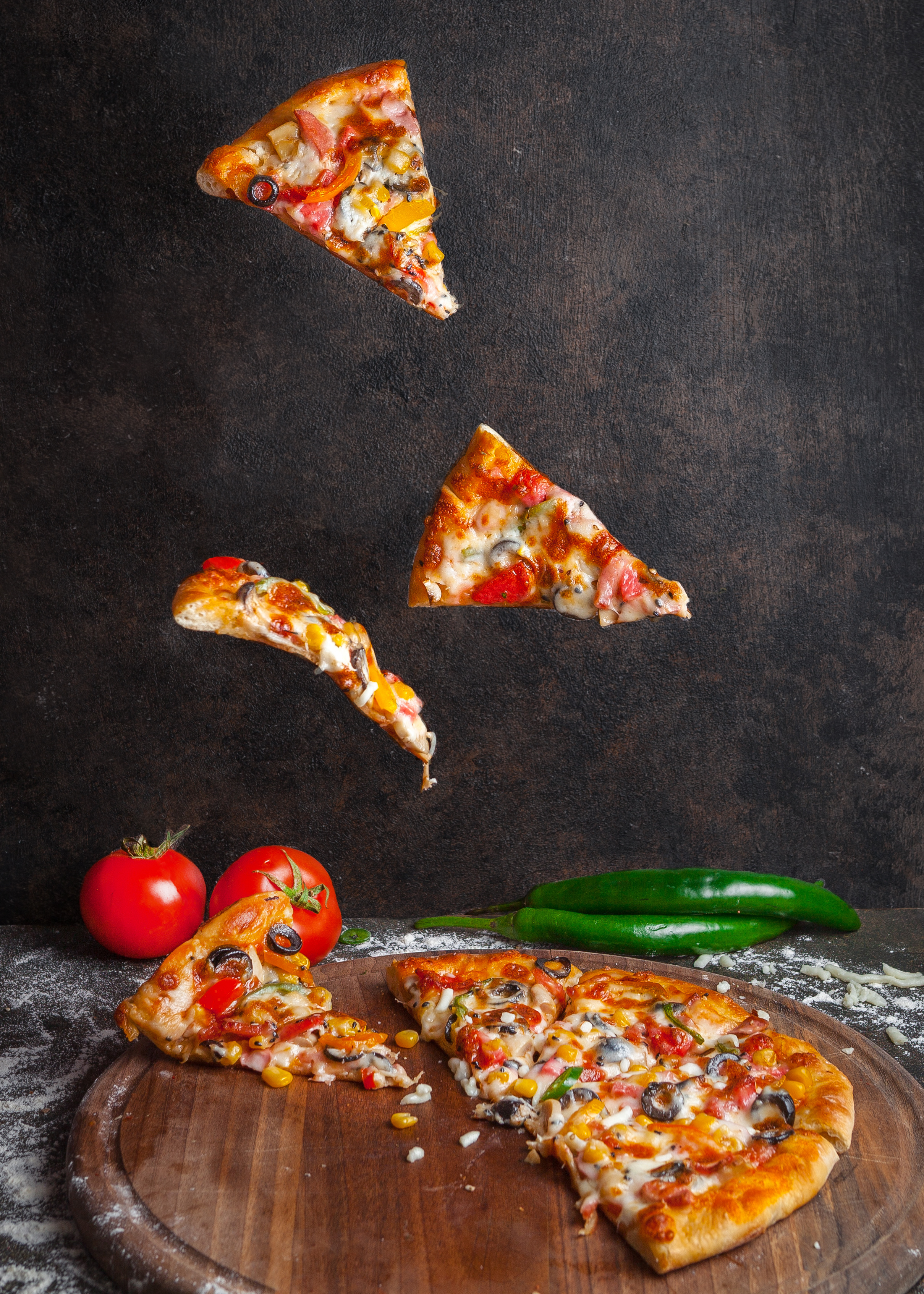 Placing toppings on pizza